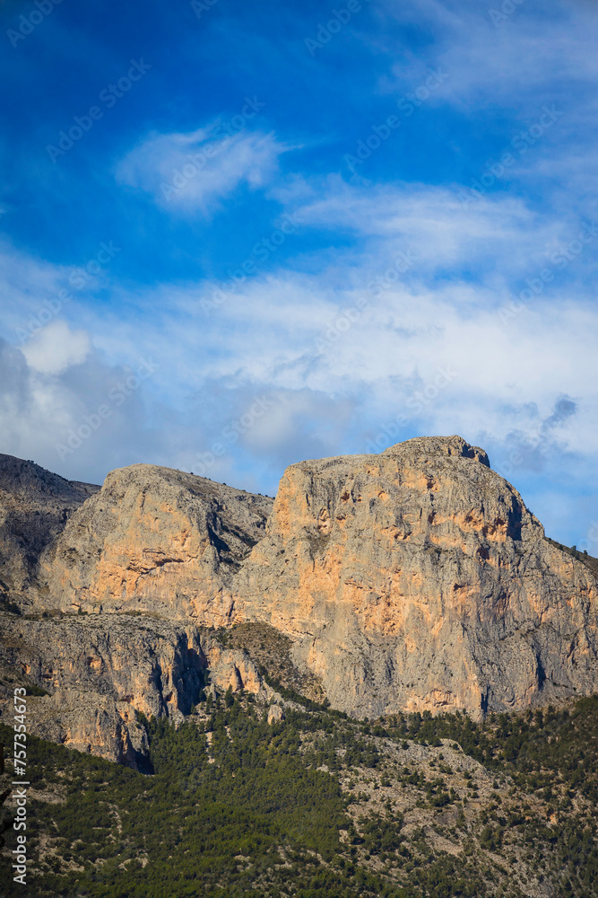 Obraz premium Mountainscape view of the beautiful spanish sierra of Puigcampana and El Ponotx. Mountain landscape in Spain in the province of Alicante - Benidorm
