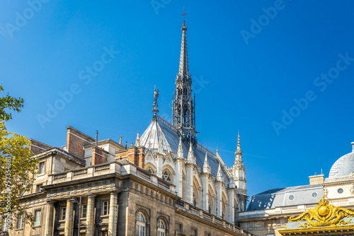 Apse and spire of the Sainte-Chapelle church on sunny day in Paris, France
