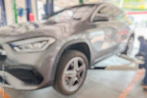 car service centre auto repair workshop blurred background © Piman Khrutmuang