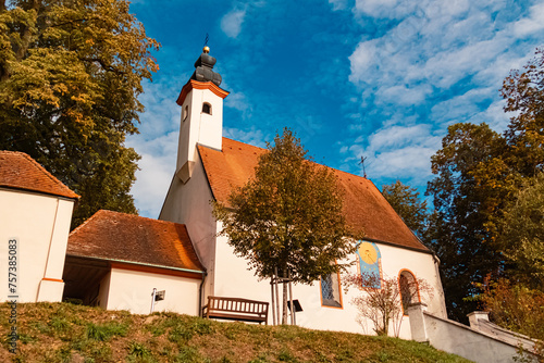 Chapel on a sunny autumn or indian summer day near Haardorf, Osterhofen, Danube, Deggendorf, Bavaria, Germany photo