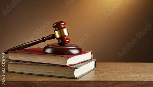 Wooden gavel and books on wooden table, law concept