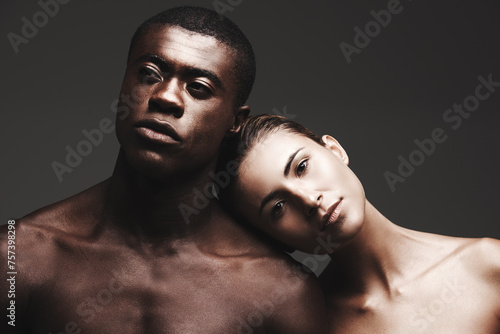 Portrait, balck man or woman in skincare, dermatology or beauty as health, wellness or love. Interracial couple, glow or face as healthy, aesthetic or diversity in bonding together on grey background photo