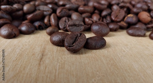 Fototapeta Naklejka Na Ścianę i Meble -  Coffee beans background. Close up of roasted coffee beans.