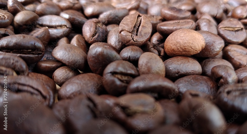 Coffee beans background. Close up of roasted coffee beans. Coffee beans background. Close up of roasted coffee beans.