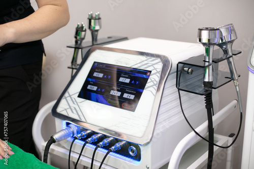 device for various massage tips, RF-lifting, vacuum-impulse massage, ultrasonic cavitation