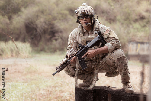 Bilde på lerret Soldiers in camouflage military uniforms carrying weapons, Reconnaissance missions in the tropical forest area, Assault infantry battle training