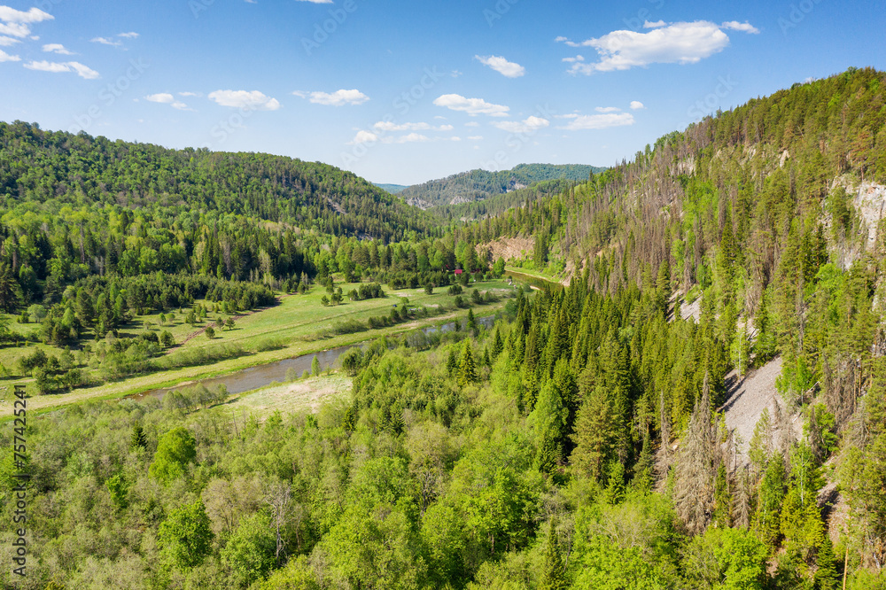 Fototapeta premium The Southern Urals in summer, the Zilim River in the Kultamak natural boundary. Aerial view.