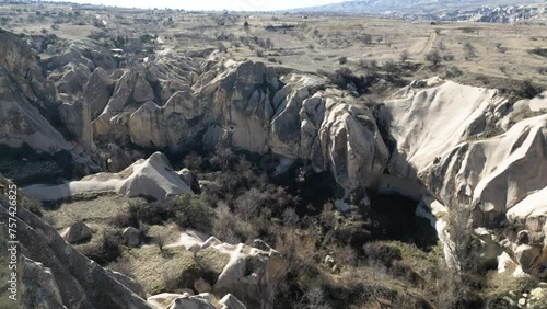 Aerial view of a valley filled with fairy chimneys in Cappadocia. photo