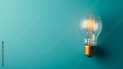 Idea concept, single modern light bulb over blue background with copy space 