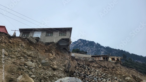 Destroyed home during flood in sawat pakistan photo