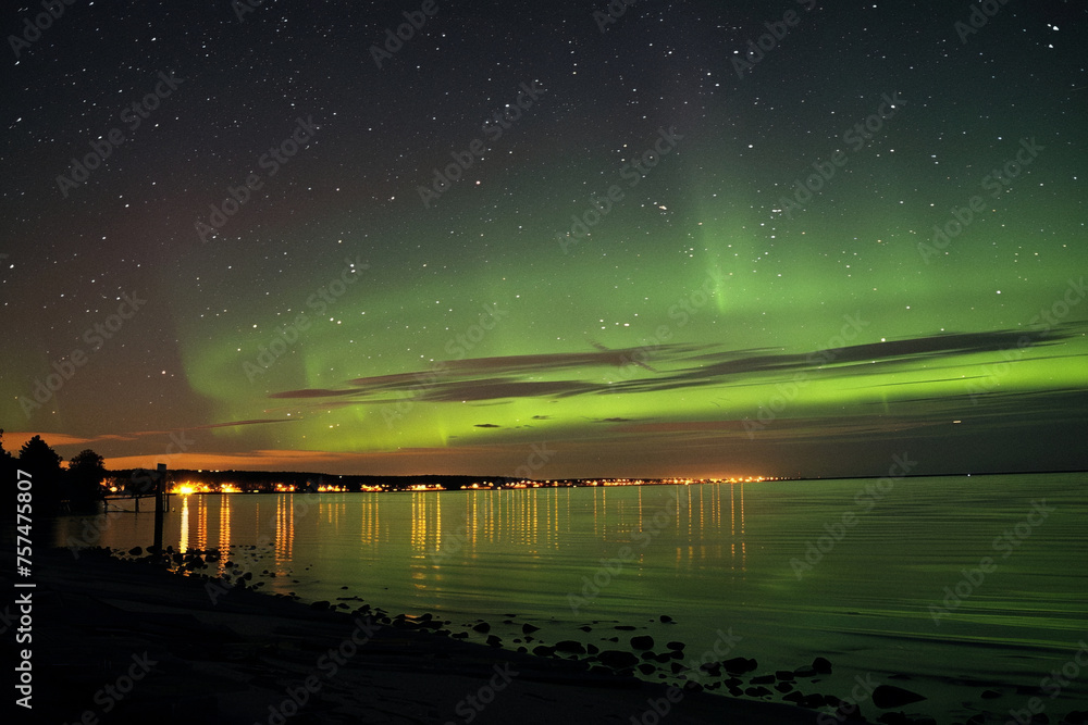 aurora borealis northern lights over the shore of the sea in Tallinn Estonia