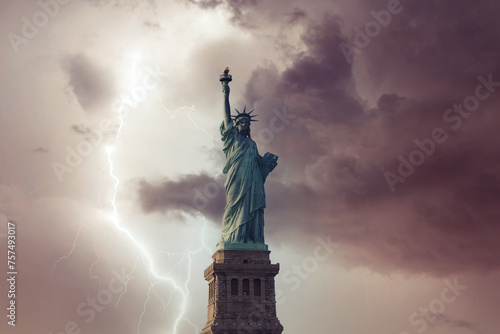 View on Statue liberty from Hudson river on the stormy sky with lightning strike