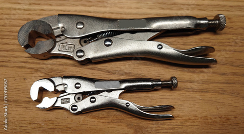 Photography locking nut pliers especially useful in automotive engine repair