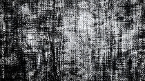 This image showcases the intricate details and texture of a black fabric, with a focus on the complexity of the weave pattern