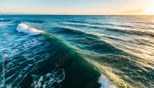 Sea waves. Deep blue ocean water. Sunny natural landscape. Travel and tourism