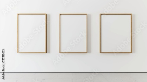 Picture frames on a white wall in a minimalist interior