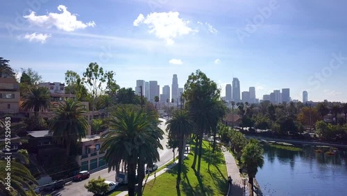Cityscape downtown LA establishing drone shot over green space