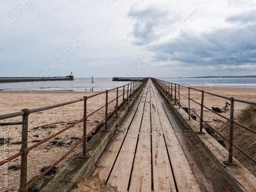 Blyth, Northumberland, UK entrance to port with pier and lighthouse. © joe888