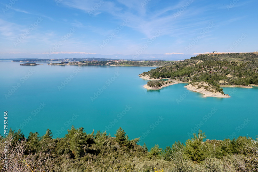 A sunny spring day view of the Seyhan Lake on the Seyhan River with its unique turquoise blue water