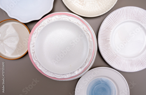 Variety of ceramic or porcelain trendy plates flat lay copy space
