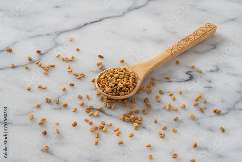 Close-up of brown fenugreek seeds photo