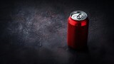 Red aluminum blank soda can with water, dew drops. Blank labeled. Isolated on dark background. Room for copy space.