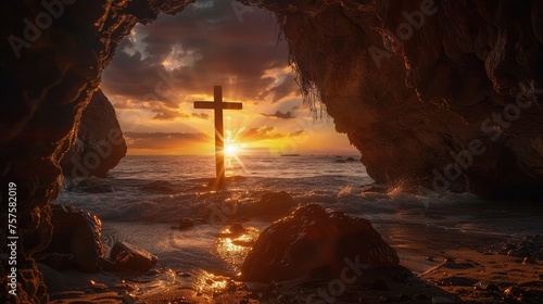 Sunset view of a wooden cross from a cave. © buraratn