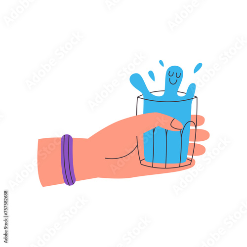 Hand holding glass of water