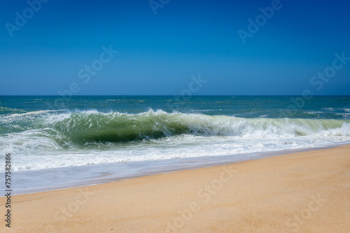 Waves seen from North Beach famous for giant waves in Nazare town on so called Silver Coast, Oeste region of Portugal