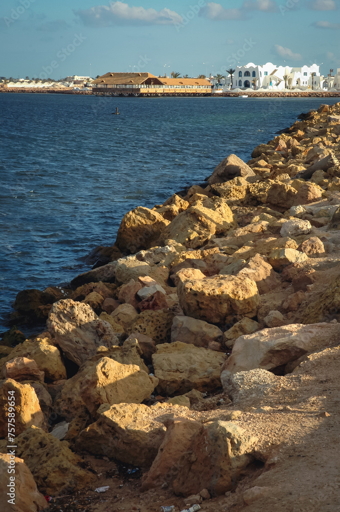 Breakwater in Port of Ajim town on Djerba Island, Tunisia Breakwater in Port of Ajim town on Djerba Island, Tunisia