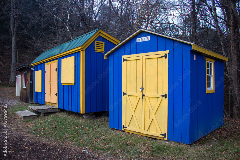 Naklejka premium Wooden Blue Sheds with Yellow Doors in Brattleboro, Vermont