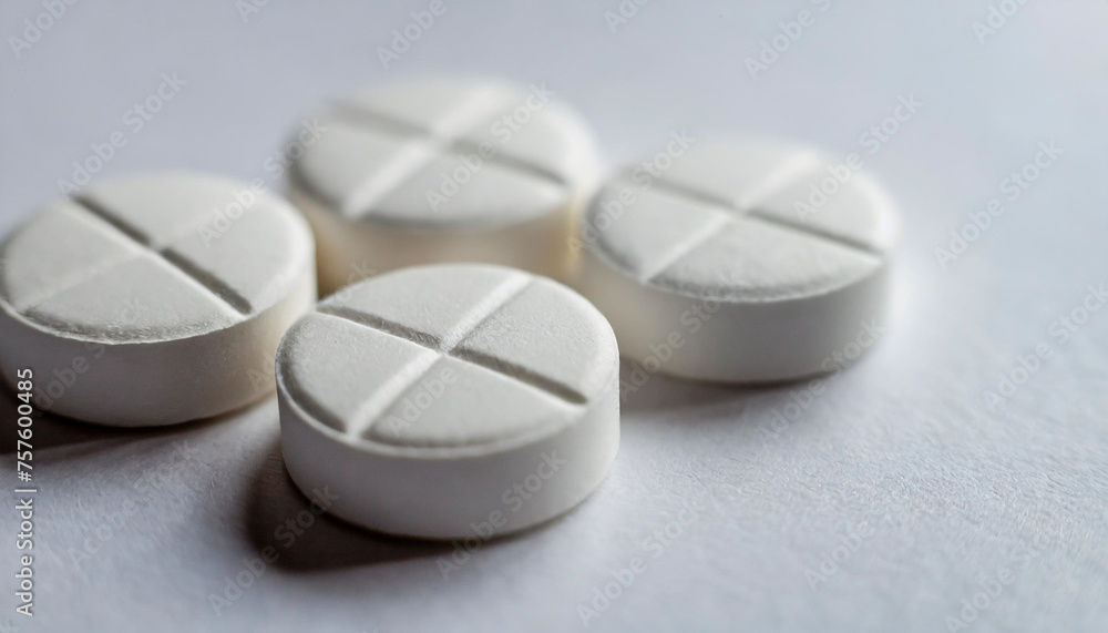 White round pills on white background symbolize purity and health, isolated, beautiful, unique White round pills on white background symbolize purity and health, isolated, beautiful, unique
