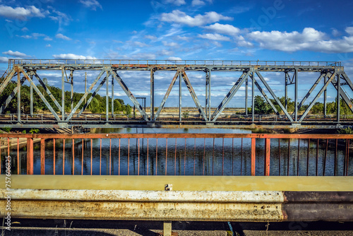 Railway bridge over canal of cooling lake in Chernobyl Nuclear Power Plant, Ukraine