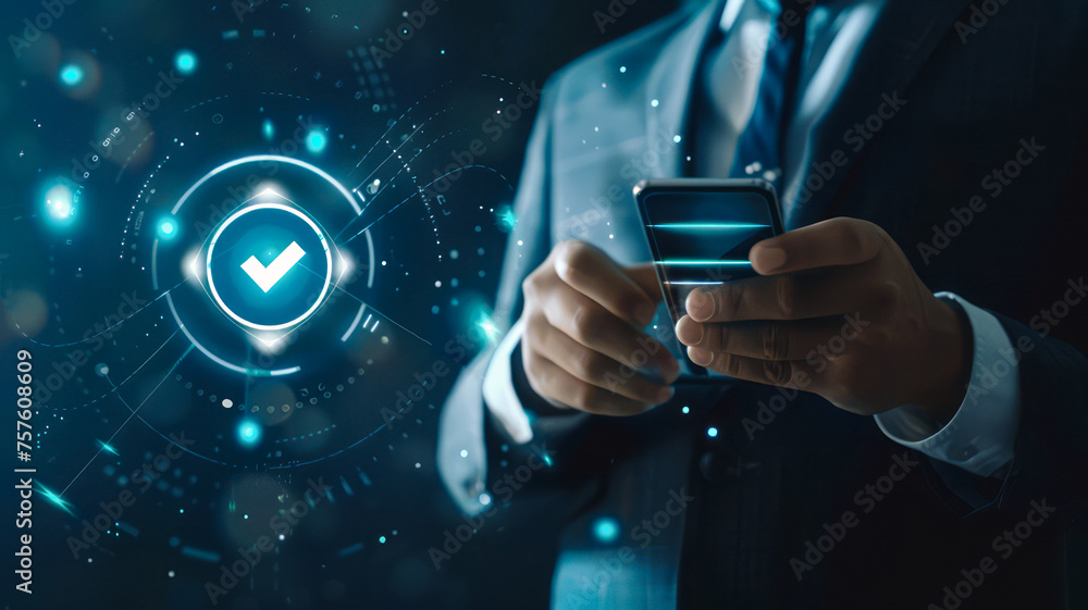 Businessman holding phone, using it for checklists and tracking business performance. Businessman holding phone, using it for checklists and tracking business performance.
