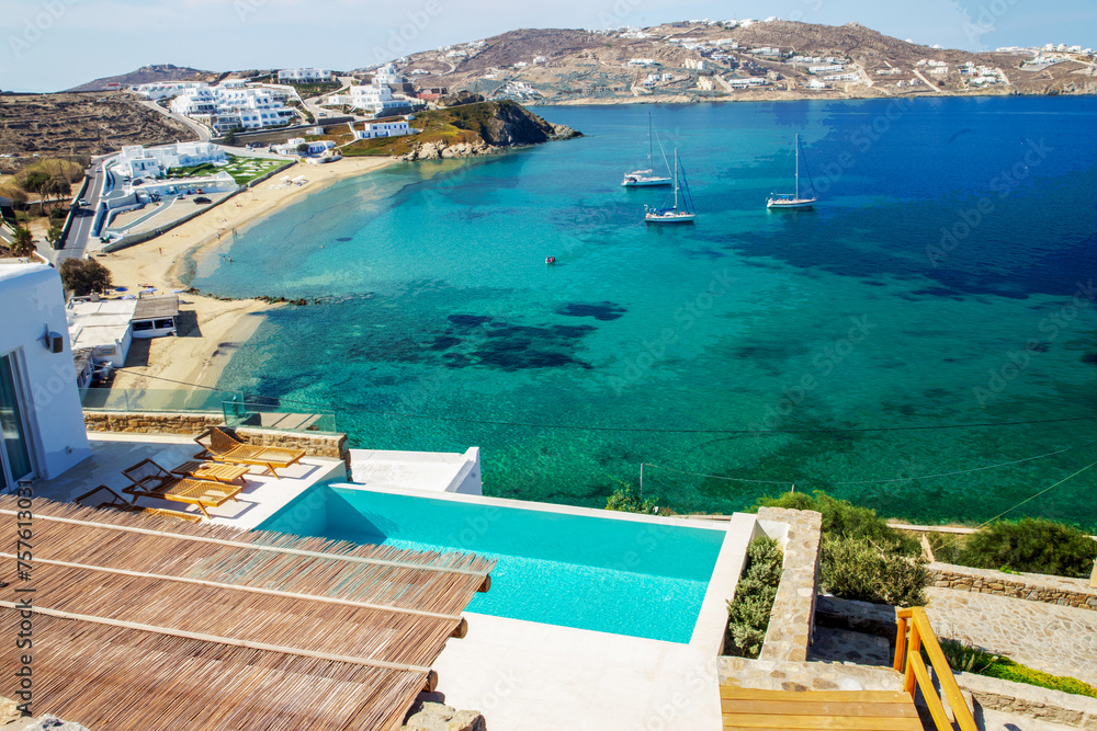 Awe villa (part of) for rent on one the best Greek islands of Mykonos -  pool and sun loungers.  And fantastic view