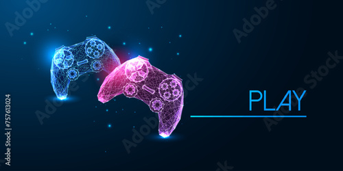Two video game controllers glowing in electric blue and puprple on a dark blue background