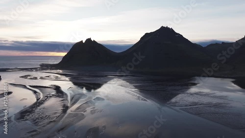 Reflection On Stokksnes, Hofn, East Iceland, Iceland. Mount Westerhorn Seen Near The Bay photo