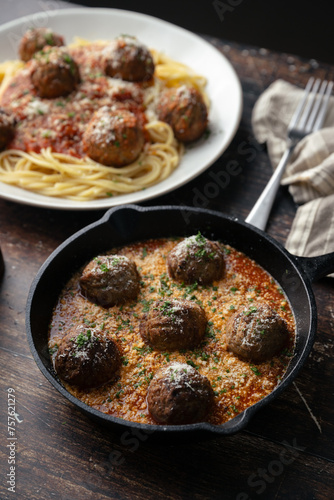 italian meat balls with marinara sauce and spaghetti