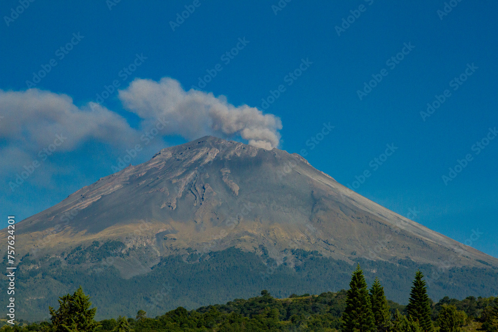 Fototapeta premium View of the Popocatepetl Volcano in the State of Mexico, Mexico. Volcano fumarole. Active volcano. 