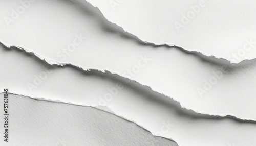 Isolated single white torn paper piece on plain white background for unique design purposes