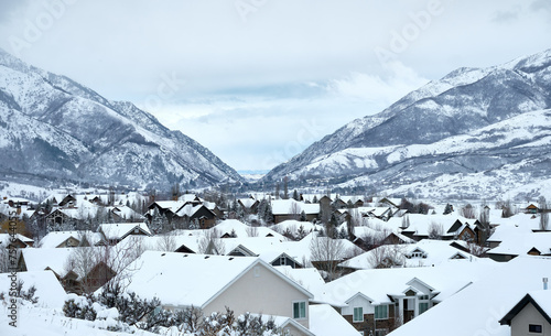 Rooftops in Mountain Green, Utah, and Weber Canyon, through which some buildings of Ogden can just be made out.