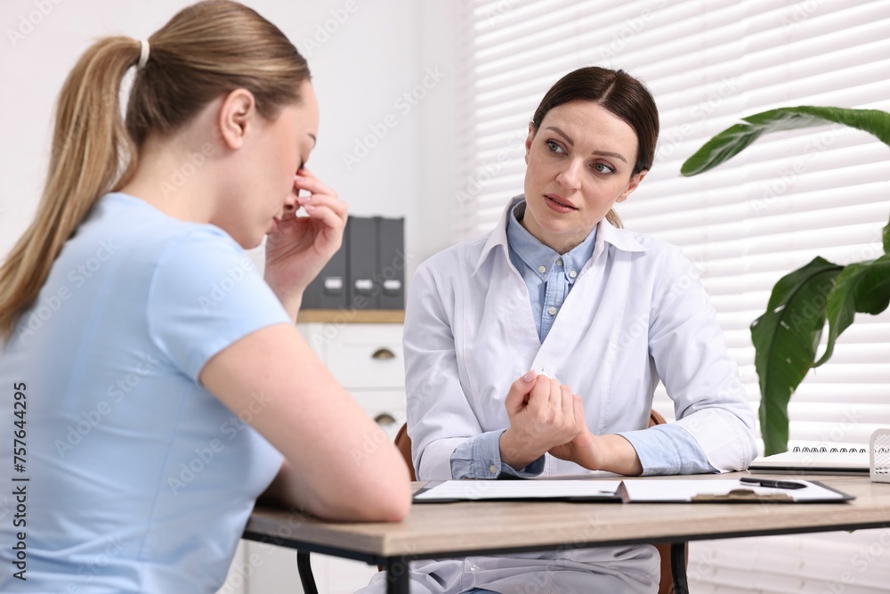 Mammologist's appointment. Doctor and woman in hospital Mammologist's appointment. Doctor and woman in hospital