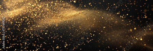 Golden wave of dust on a black background