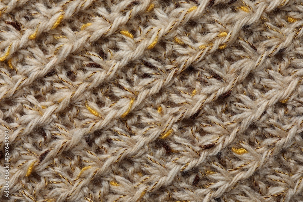 Texture of knitted fabric as background, top view