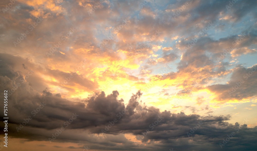 Sunrise background. Dramatic sunset background. Sky with clouds in Sunrise sky light background. Sunrise with clouds in various shapes background. Calm Sunrise. Sunrise background. Dramatic sunset background. Sky with clouds in Sunrise sky light background. Sunrise with clouds in various shapes background. Calm Sunrise.