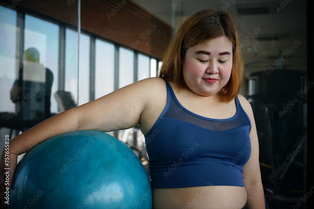 Fat diet and scale feet standing on electronic scales for weight control. Measurement instrument in kilogram for a diet control. Fat diet and scale feet standing on electronic scales for weight control. Measurement instrument in kilogram for a diet control.