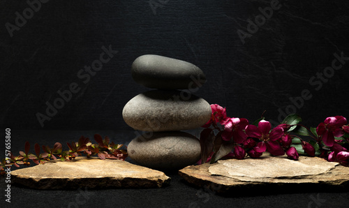 minimalistic composition of stones and flower plants for the podium. podium made of stones for the presentation of perfumery, cosmetics, medicine, jewelry products © serhii