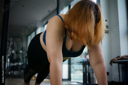 Overweight woman exercising for weight loss. Fat woman diet healthy lifestyle concept