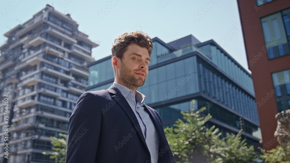 Rich businessman going downtown sunny morning close up. Successful man walking Rich businessman going downtown sunny morning close up. Successful man walking