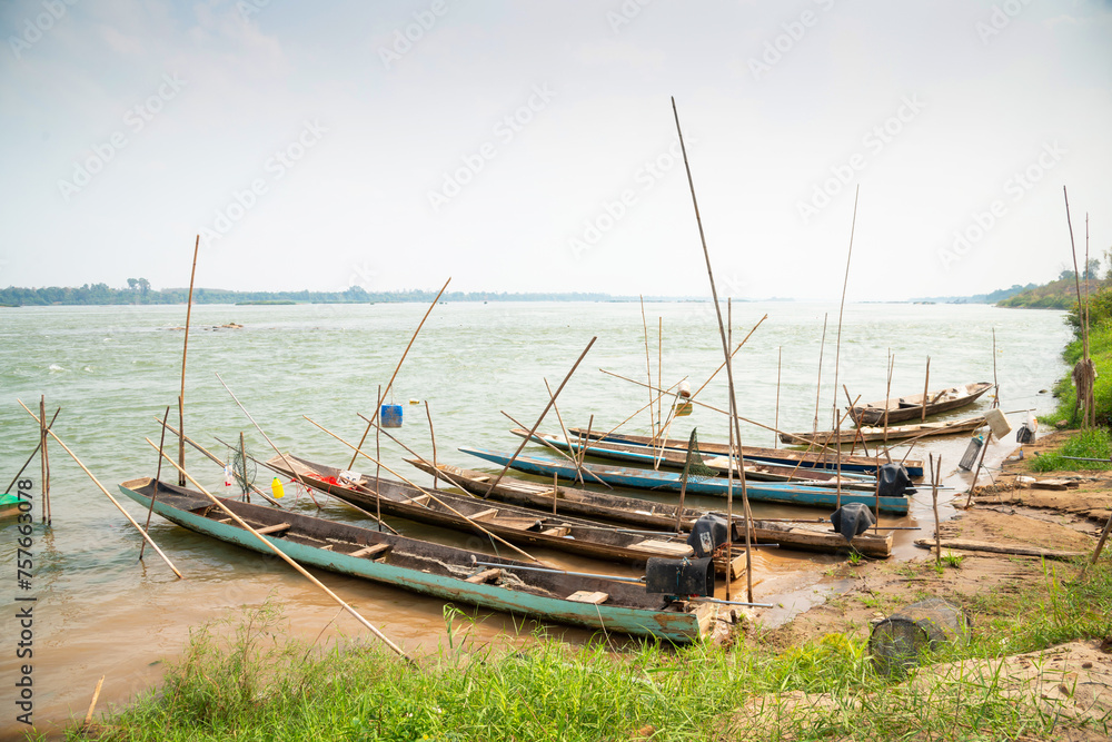 Fishmen Boat at the coat of the Mae Khong River in Thailand, The Way of life along the Fishmen Village. Fishmen Boat at the coat of the Mae Khong River in Thailand, The Way of life along the Fishmen Village.